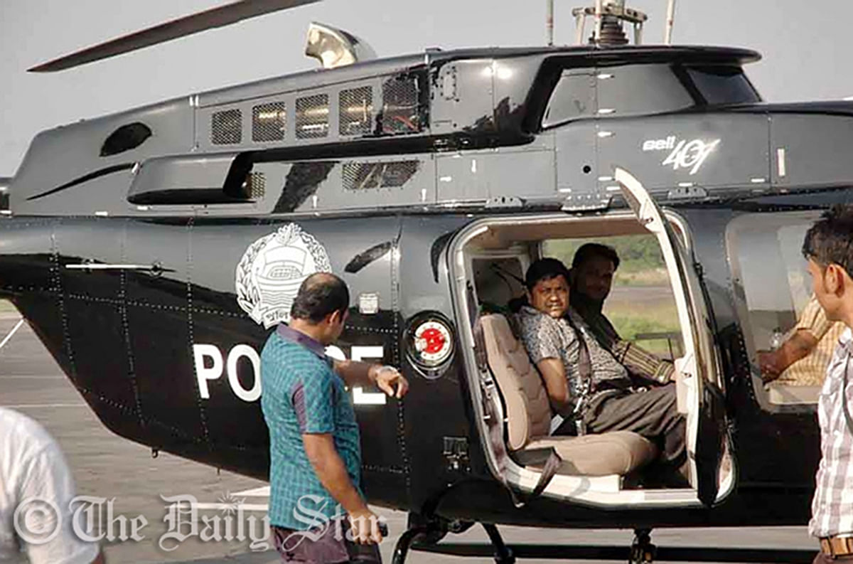 Police bring Sohel Rana, owner of Rana Plaza, to Dhaka by helicopter after he was arrested while trying to flee through the Jessore border. Photo: Star