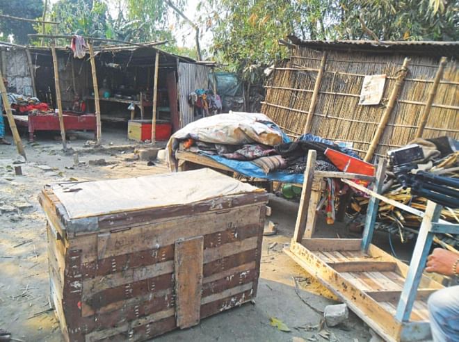 Rape victim's house lies vandalised at Mostafi village in Lalmonirhar Sadar upazila. The rapist and his accomplices attacked and looted the house on Tuesday following a case filed by the victim with the local police station the day before. Photo: Star
