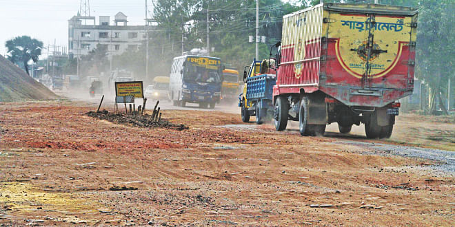 The journey of people during Eid holidays might be as troublesome as it was last year on the Dhaka-Mymensingh route. If the road is not repaired before the vacations, the worn-out surface and potholes at numerous spots will cause a bumpy ride, which means unusually extra travel time and fuel -- not to mention a long tailback. The photo was taken at Masterbari in Gazipur Sadar on Monday.     Photo: Amran Hossain