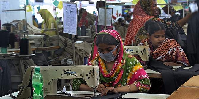 This May 17, 2013 photo shows employees at work in a garment factory of Ashulia, an outskirt area of the capital. Photo: STAR