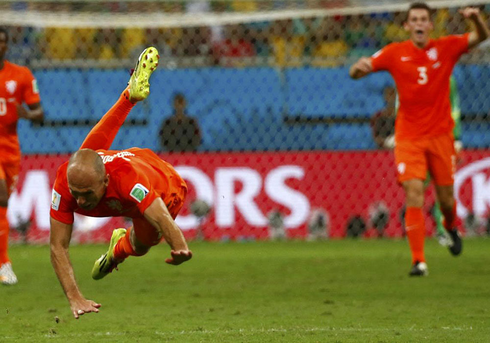 Arjen Robben of the Netherlands is fouled during their 2014 World Cup quarter-finals against Costa Rica at the Fonte Nova arena in Salvador July 5, 2014.