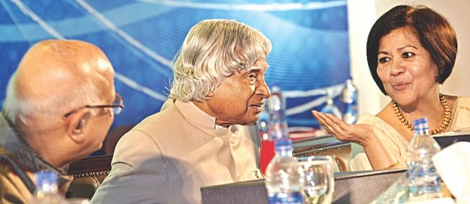 Rokia Afzal Rahman, president of MCCI, shares a light moment with APJ Abdul Kalam, former president of India, as Finance Minister  AMA Muhith looks on, at the chamber's 110th anniversary celebrations at Bangabandhu International Conference Centre in Dhaka yesterday.   Photo: Star 