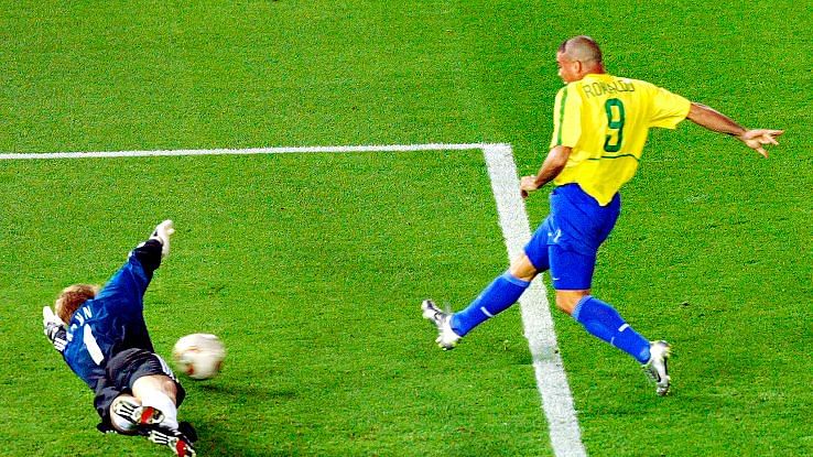 Ronaldo slots the ball past Oliver Kahn in the 2002 World Cup final.