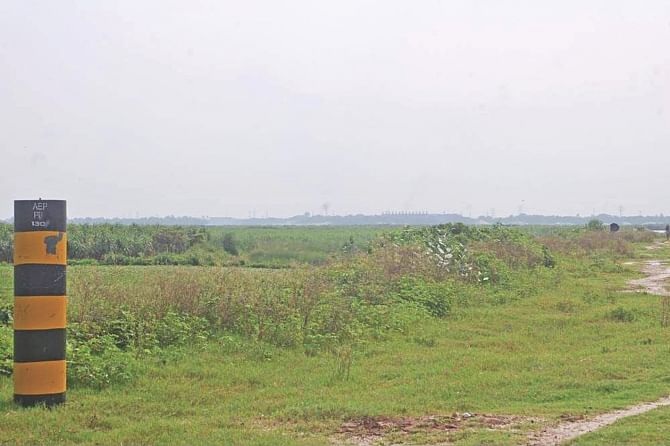 The pillar on the left marks the boundary of Rooppur nuclear power plant project and the river Padma was supposed to be close by. But over the years the river has moved a distance and the plant site now is 2.5km away from the flow of the river. Photo: Star