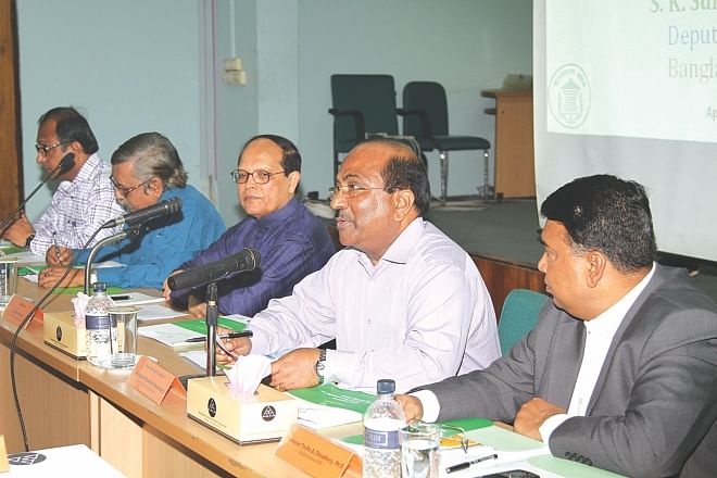 Second from right, SK Sur Chowdhury, deputy governor of Bangladesh Bank, speaks on tax exemption for banks' CSR spending, at a roundtable in Dhaka yesterday. Atiur Rahman, governor of BB, was also present.  Photo: star