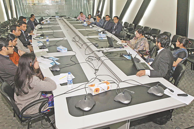 Participants at a roundtable titled “Lawyers as Changemakers” at The Daily Star Centre in the capital yesterday, organised by iProbono, an online platform.  Photo: Star