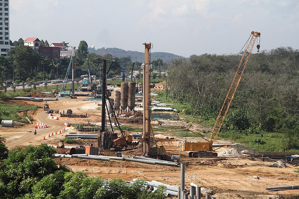 Piling works in progress for the construction of the MRT alignment at the Rubber Research Institute near the Sungai Buloh-Subang road. Photo: MRT Corp