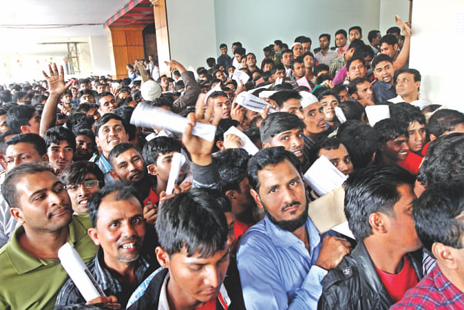 Hundreds of others were seen waiting outside the building. Photo: Sk Enamul Haq