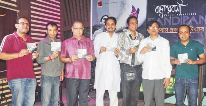 Subir Nandi (3-L) with guests at the album launch. 