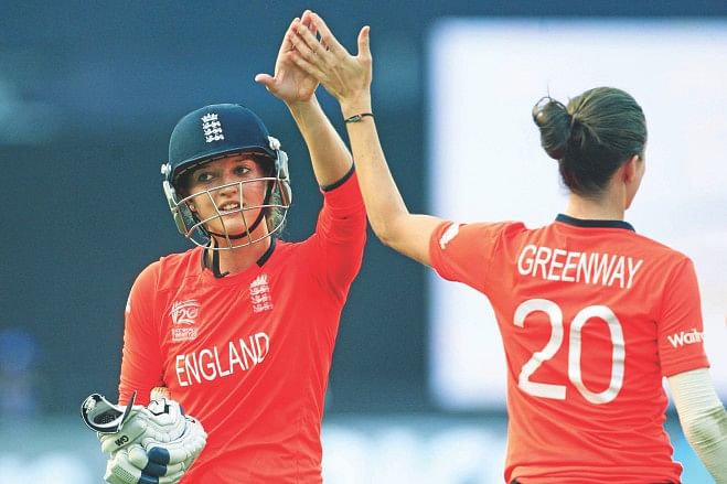  England opener Sarah Taylor (L) celebrates their side's progress to the ICC Women's World Twenty20 final by beating South Africa in the second semifinal at the Sher-e-Bangla National Stadium in Mirpur yesterday. PHOTO: STAR