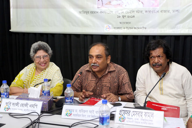 Centre, Monirul I Khan, chairman of Dhaka University's sociology department, speaks at a seminar on national budget and bidi industry, organised by Research and Development Collective (RDC), at The Daily Star Centre in Dhaka yesterday. Left, Lawmaker Kazi Rozi and Prof Mesbah Kamal, right, chairperson of RDC, were also present. Photo: Star