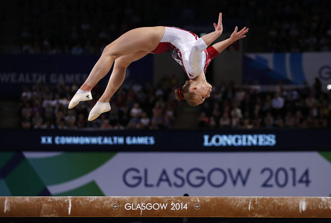 Elsabeth Black of Canada performs on the beam during the women's gymnastics apparatus final at the Commonwealth Games in Glasgow yesterday. She won gold in the event. PHOTO: REUTERS