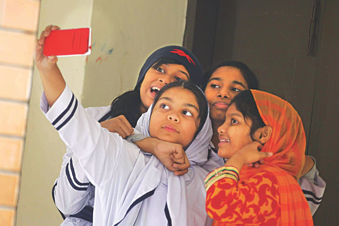 SELFIE TIME: Students of Monipur High School & College that topped the PSC results.  Photo: Rashed Shumon 