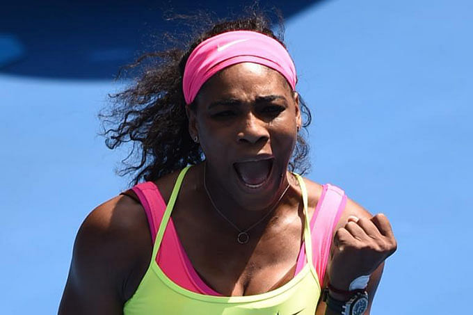 Serena Williams of the US celebrates winning her women's singles match against Slovakia's Dominika Cibulkova, on day ten of the Australian Open, in Melbourne, on January 28, 2015. Photo: AFP