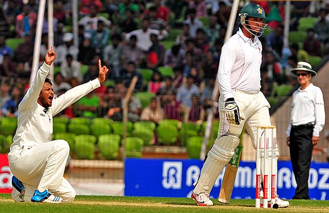 Shakib Al Hasan appeals for a leg before and the finger of the umpire goes up during the second innings of second Test at Khulna. Photo: Firoz Ahmedsuccessfully for a Zimbabwean wicket on November 5, 2014. Photo: Firoz Ahmed