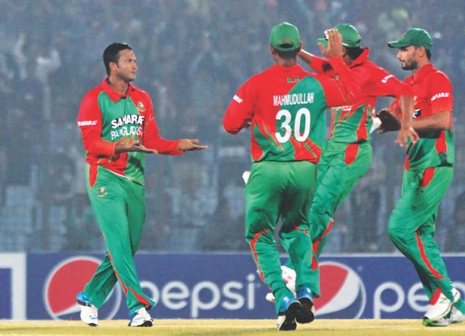 Shakib Al Hasan (L) had another outstanding performance yesterday, smashing a century and taking four wickets to help Bangladesh draw first blood in their five-match ODI series against Zimbabwe. PHOTO: STAR