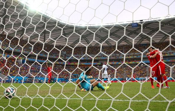 Xherdan Shaqiri of Switzerland shoots and scores his team's third goal and complete his hat trick during the 2014 FIFA World Cup Brazil Group E match between Honduras and Switzerland at Arena Amazonia on June 25, 2014 in Manaus, Brazil. Photo: Getty Images