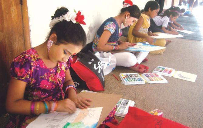 Children participate in the art competition. Photo: Star