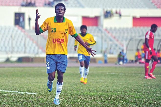 Sheikh Jamal's Haitian striker Wedson Anselme gestures after converting a penalty to give his team the decisive lead against Muktijoddha Sangsad in their Bangladesh Premier League match at the Bangabandhu National Stadium yesterday. PHOTO: STAR