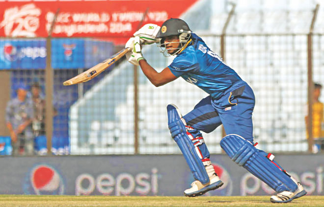 Sri Lanka opener Kusal Perera drives through the off side on way to scoring a 40-ball 61 in their World Twenty20 Group 1 match against South Africa at the Zohur Ahmed Chowdhury Stadium in Chittagong yesterday.   PHOTO: ANURUP KANTI DAS