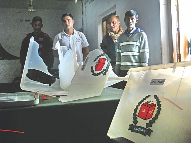 Smashed ballot boxes at Korpur High School polling centre in Sonatala upazila of Bogra yesterday after supporters of a pro-Awami League upazila chairman candidate attacked and vandalised the centre.  Photo: COURTESY