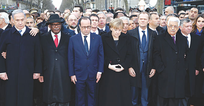 Give Peace A Chance... Israel's Prime Minister Benjamin Netanyahu and Palestinian President Mahmoud Abbas joined French President François Hollande and other world leaders in a solidarity march in Paris yesterday. Crowds of around 1.5 million walked through the City of Light in an unprecedented tribute to the victims of last week's terror rampage that left 17 people dead.  Photo: AFP