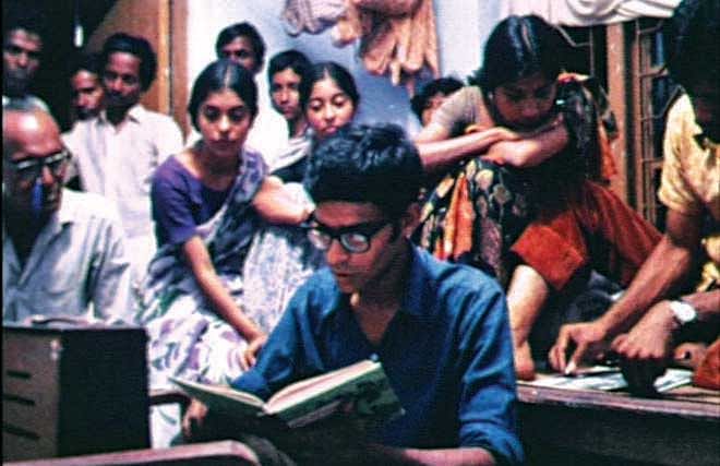 Artistes of Bangladesh Mukti Shangram Shilpi Shangstha  listen to the radio in 1971. Photo courtesy: Tareque Masud Memorial Trust