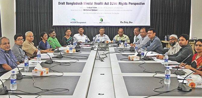 Discussants of a roundtable, “Draft Bangladesh Mental Health Act, 2014: Rights Perspective”, organised by Innovation for Wellbeing Foundation, INCIDIN Bangladesh, and The Daily Star at the daily's office in the capital yesterday. Photo: Star