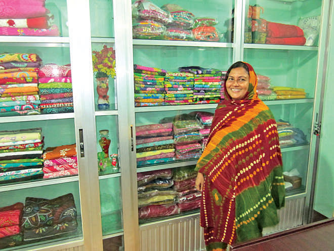 Entrepreneur Ismat Ara Mukta in the showroom of her Shui Shuta Handicrafts.  Photo: Andrew Eagle
