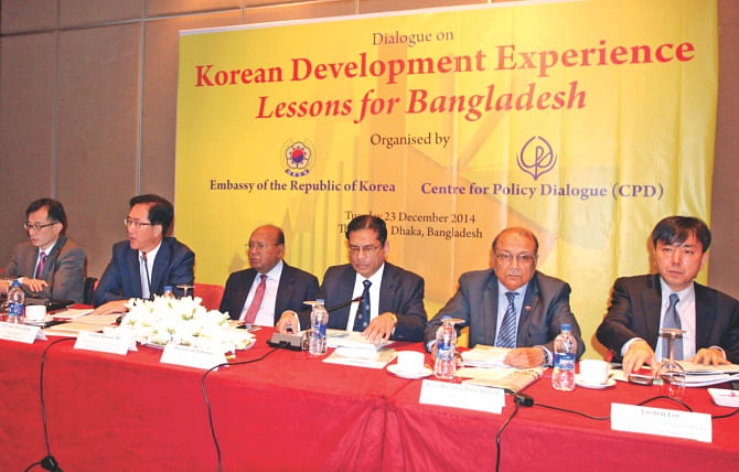 Third from left, Commerce Minister Tofail Ahmed attends a dialogue, jointly organised by the Korean Embassy and Centre for Policy Dialogue, at the Westin hotel in Dhaka yesterday.  Photo: Star 