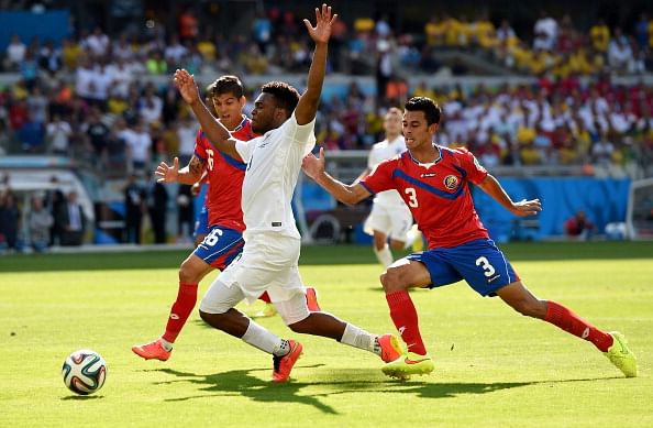 Daniel Sturridge of England reacts as he's challenged by Cristian Gamboa (L) and Giancarlo Gonzalez of Costa Rica during the 2014 FIFA World Cup Brazil Group D match between Costa Rica and England at Estadio Mineirao on June 24, 2014 in Belo Horizonte, Brazil. Photo: Getty Images