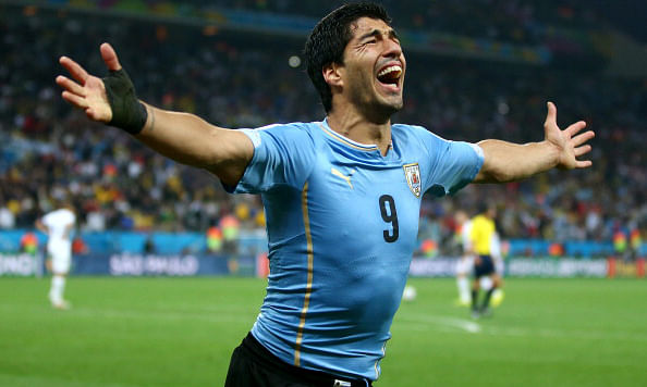 Luis Suarez of Uruguay celebrates after scoring his team's second goal during the 2014 FIFA World Cup Brazil Group D match between Uruguay and England at Arena de Sao Paulo on June 2-, 2014 in Sao Paulo, Brazil. Photo: Getty Images