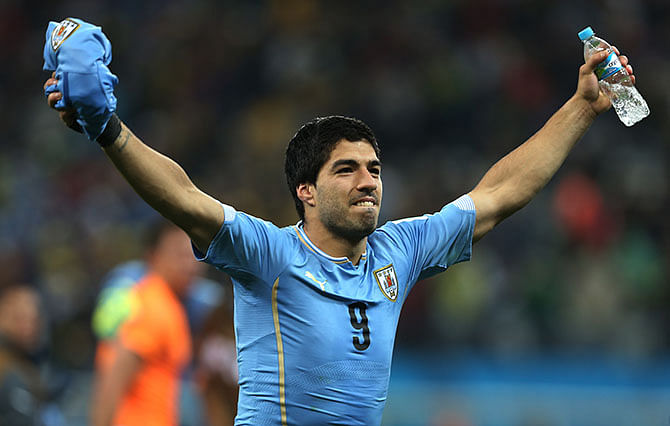 Luis Suarez of Uruguay celebrates during the Group D match of the 2014 World Cup between England and Uruguay at the Arena de Sao Paulo on June 19, 2014 in Sao Paulo, Brazil. Photo: Getty Images