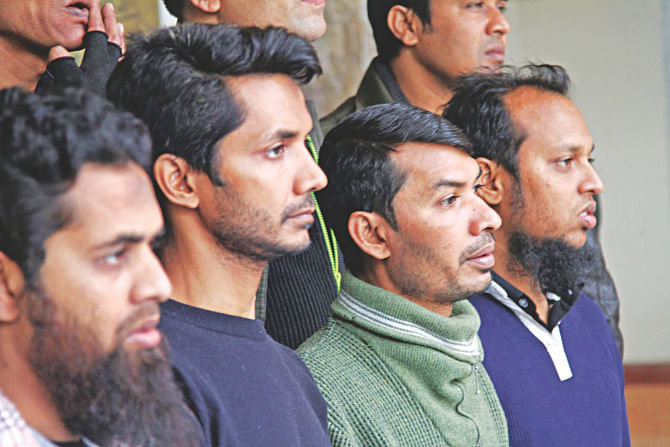 Suspected militants arrested in the capital's Jatrabari are paraded at the Dhaka Metropolitan Police Media Centre yesterday.Photo: Star