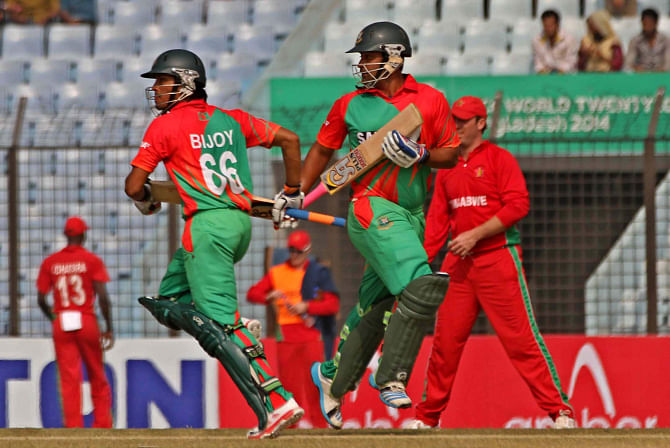 Tamim Iqbal (R) and Anamul Haque laid the required platform against Zimbabwe yesterday from where the Tigers failed to build on. The pair added 158 runs for the opening stand in an innings total of 251. Photo: Anurup Kanti Das