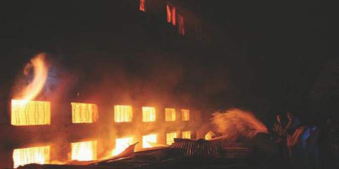 This November 24, 2012 file photo shows a scene of Tazreen Fashions Ltd fire. The fire that broke out in Ashulia, on the outskirt area of the capital, took the lives of 112 workers.