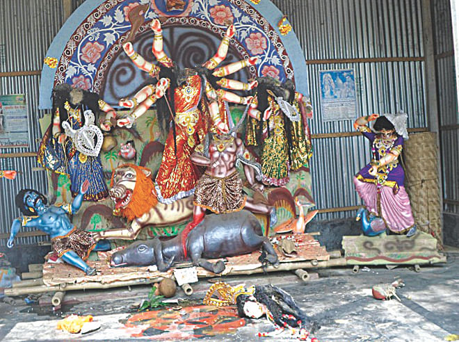 Criminals vandalised the idols of a Hindu temple at Bathania Chala of Kaliakoir in Gazipur late Tuesday night and left a note. Photo: Star
