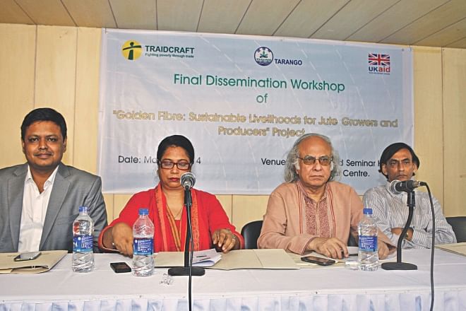 Second from right, Qazi Kholiquzzaman Ahmad, chairman of Palli Karma-Sahayak Foundation, attends a workshop of Golden Fibre Project at The Daily Star Centre in the city yesterday. Traidcraft Exchange, a UK-based charity organisation,  organised the event. Shahed Ferdous, country director of Traidcraft Exchange, was also present. Photo: Star 