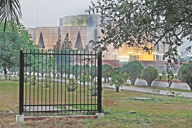 Deviating from the plans of Louis I Kahn, the parliament authorities are having an over eight-foot high iron fence laid around the South Plaza and the lawns in the east and west. Photo: amran hossain