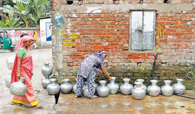 Water crisis becomes particularly severe in old parts of the city and in the slum areas. Photo: Prabir Das