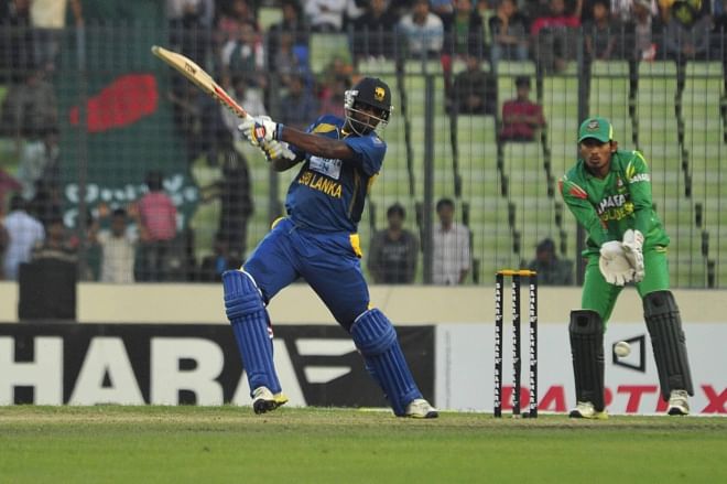 Sri Lanka all-rounder Thisara Perera pulls one on way to scoring an unbeaten knock of 80 runs, which not only revived their teetering innings, but also played a big role in coming out with 13-run win over Bangladesh in the first one-dayer at the Sher-e-Bangla National Stadium in Mirpur yesterday. PHOTO: Firoz Ahmed