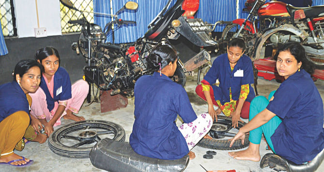 Women receive training in motorcycle repairs at Ma Fatema Women's Training and Development Complex in Shariakandi of Bogra. Photo: Star