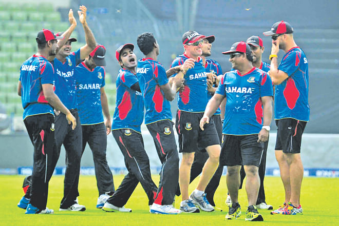 The Bangladesh team seem in high spirits during practice at the Sher-e-Bangla National Stadium in Mirpur yesterday, ahead of today's World Twenty20 Super 10 match against West Indies here.  PHOTO: STAR