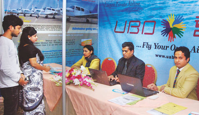 People visit the stall of United Airways at the Chittagong Travel Mart, an international tourism fair that began at the Peninsula hotel in the port city yesterday.  Photo: Triune 