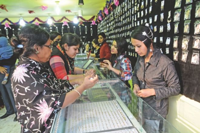 Women check out jewellery at one of the stalls. Photo: Star
