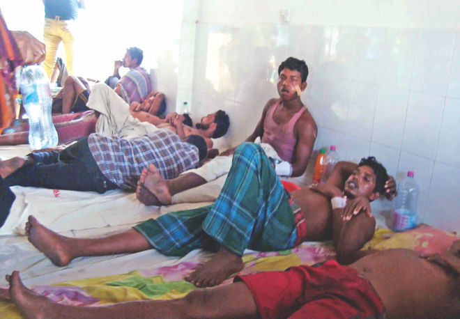 The wounded job-seekers at Cox's Bazar Sadar Hospital. Human traffickers had lured them on a boat heading for Malaysia where they endured torture and starvation.  Photo: Star