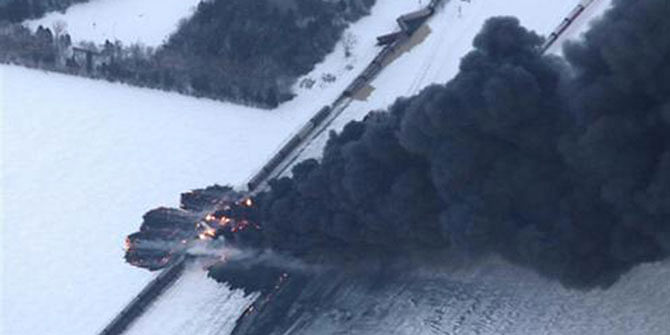  Thick black smoke was pouring from the derailed train