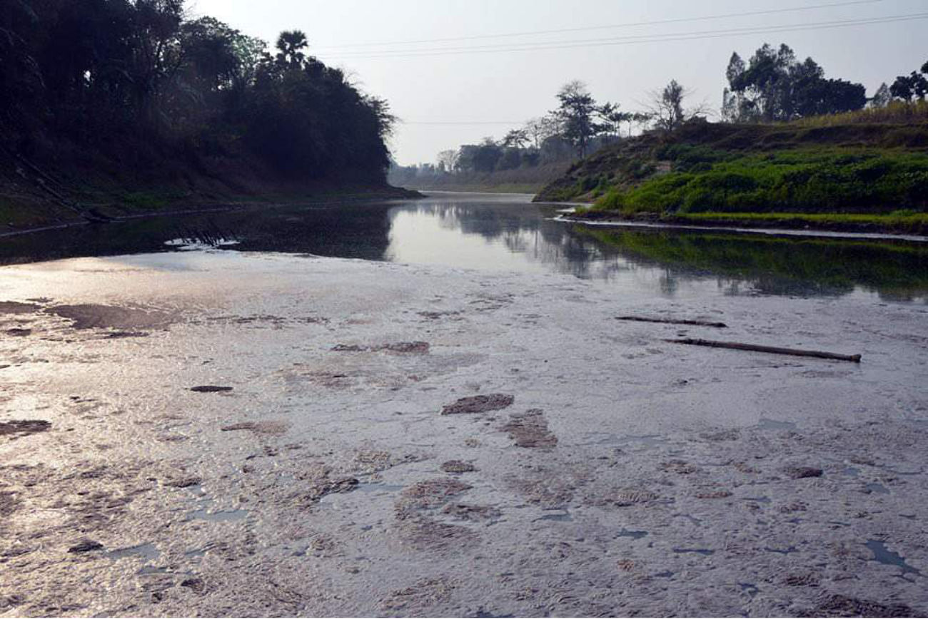 Tulsiganga River in Joypurhat district gets highly polluted as huge untreated wastes from Joypurhat Sugar Mills are released to the water body. PHOTO: STAR