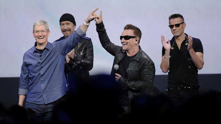 Apple's Tim Cook and U2 announced the surprise release of the band's new album 'Songs of Innocence' in Cupertino, California on September 9th, 2014. Photo taken from Rolling Stone magazine