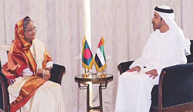 Prime Minister Sheikh Hasina talking to Sheikh Abdullah Bin Zayed Al Nahyan, foreign minister of the UAE, at St Regis hotel in Abu Dhabi yesterday. Photo: PID